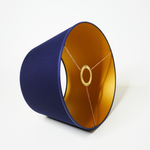 Abat-jour conique bleu marine avec intérieur doré