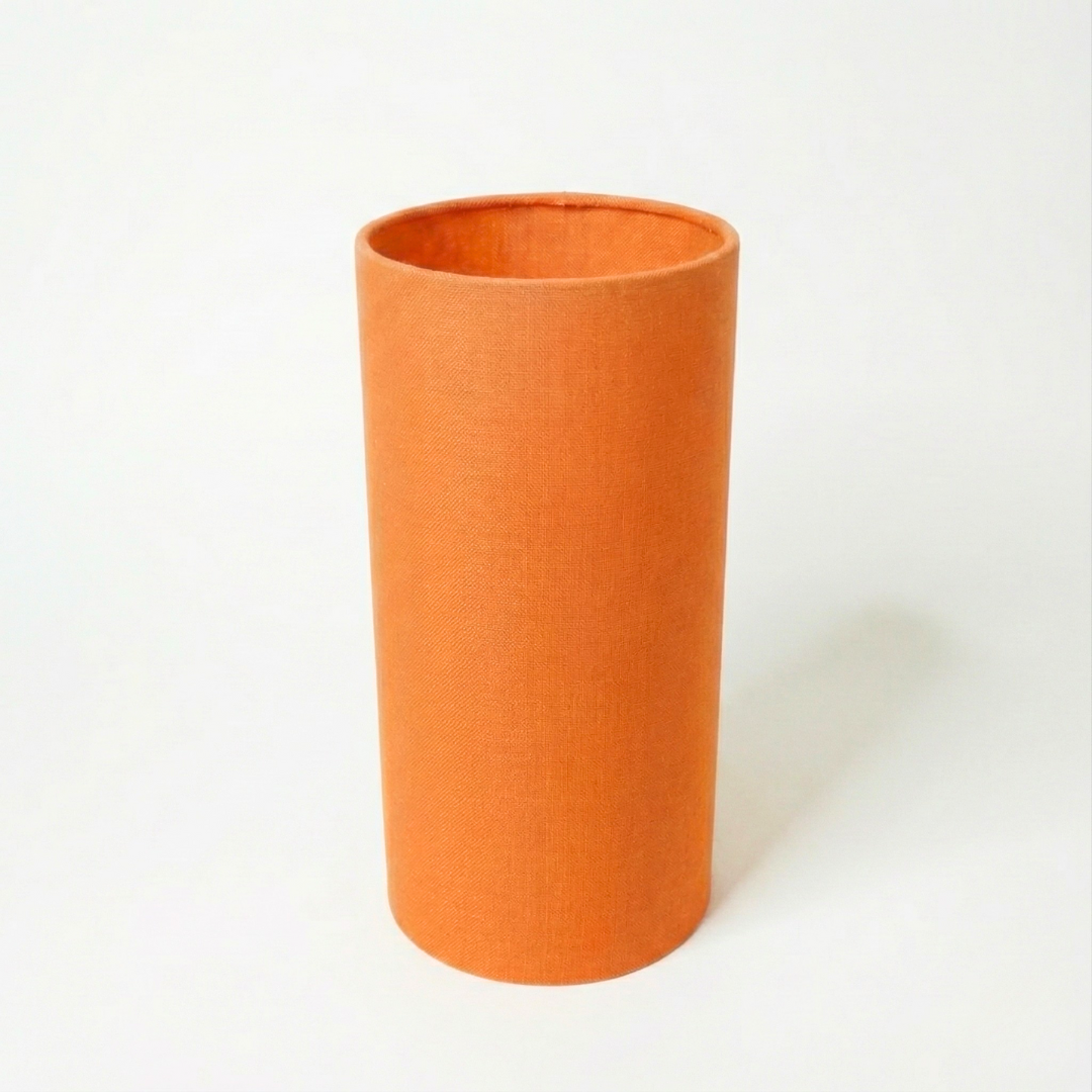 Oranje buisvormige lampenkap